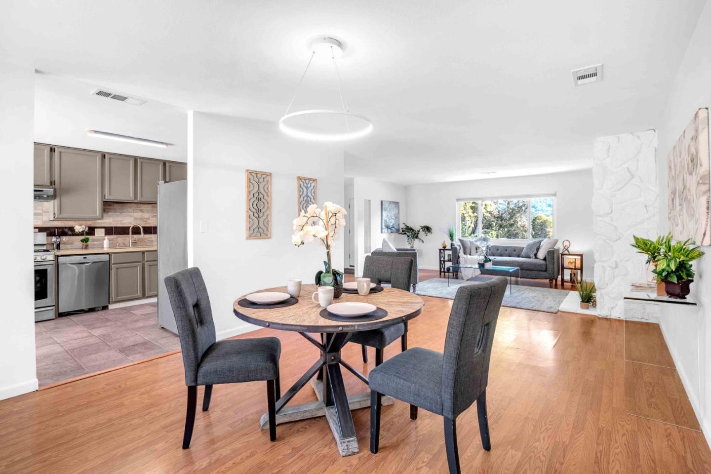 5519 Amend Road El Sobrante, CA 94803 - Photo 11 of 38 a view of a dining room with furniture and wooden floor