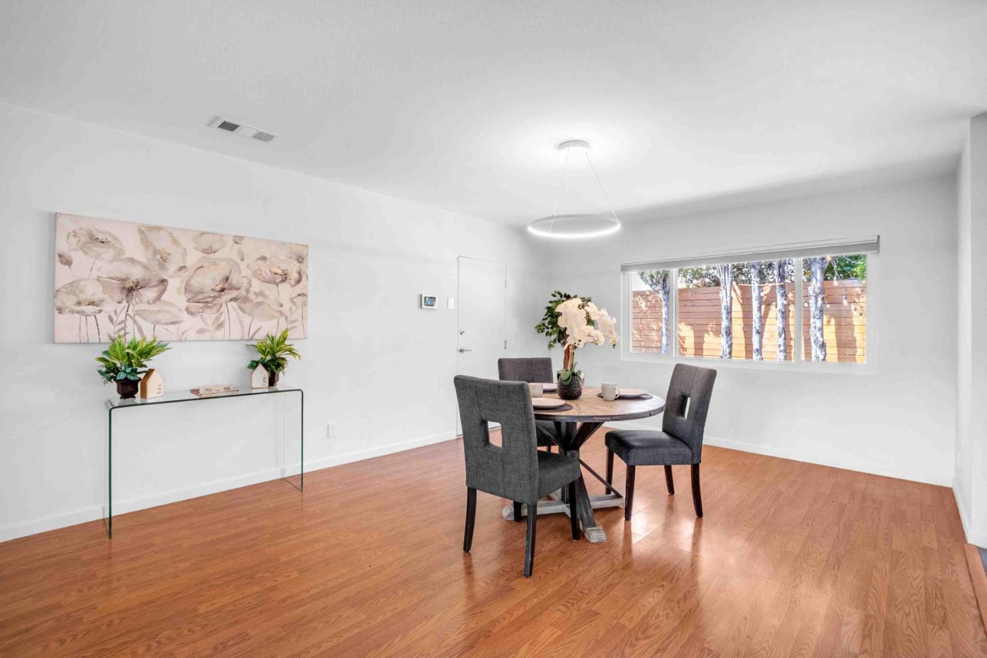 5519 Amend Road El Sobrante, CA 94803 - Photo 12 of 38 a view of a dining room with furniture window and wooden floor
