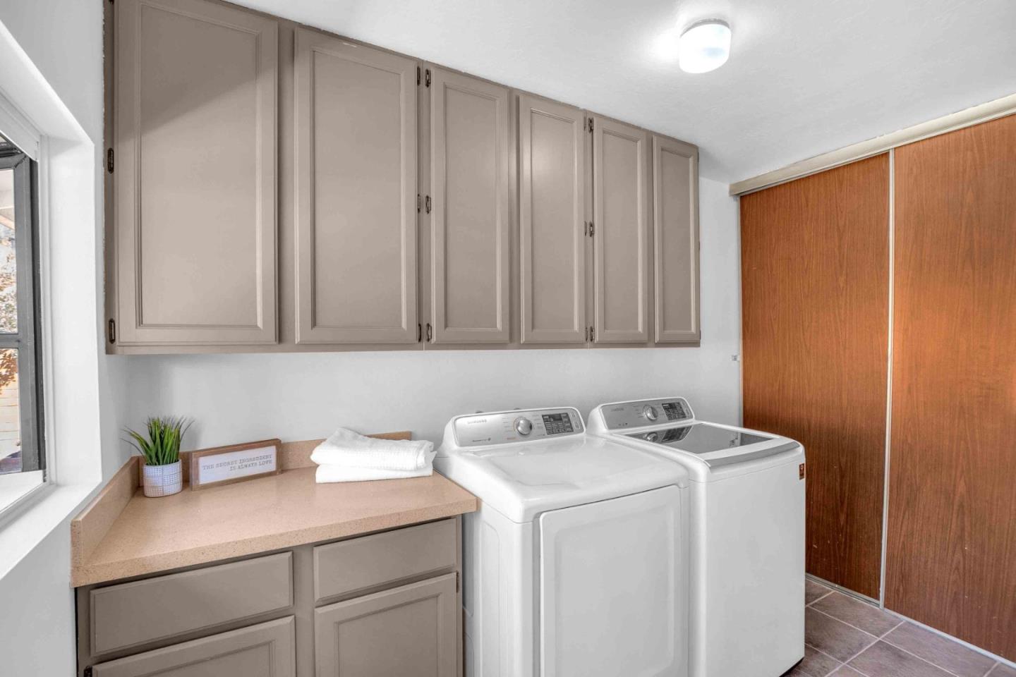 5519 Amend Road El Sobrante, CA 94803 - Photo 16 of 38 a utility room with dryer and washer