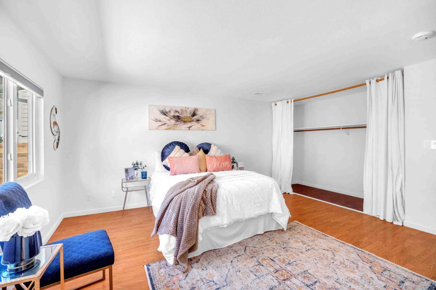 5519 Amend Road El Sobrante, CA 94803 - Photo 23 of 38 a bedroom with a bed and a couch