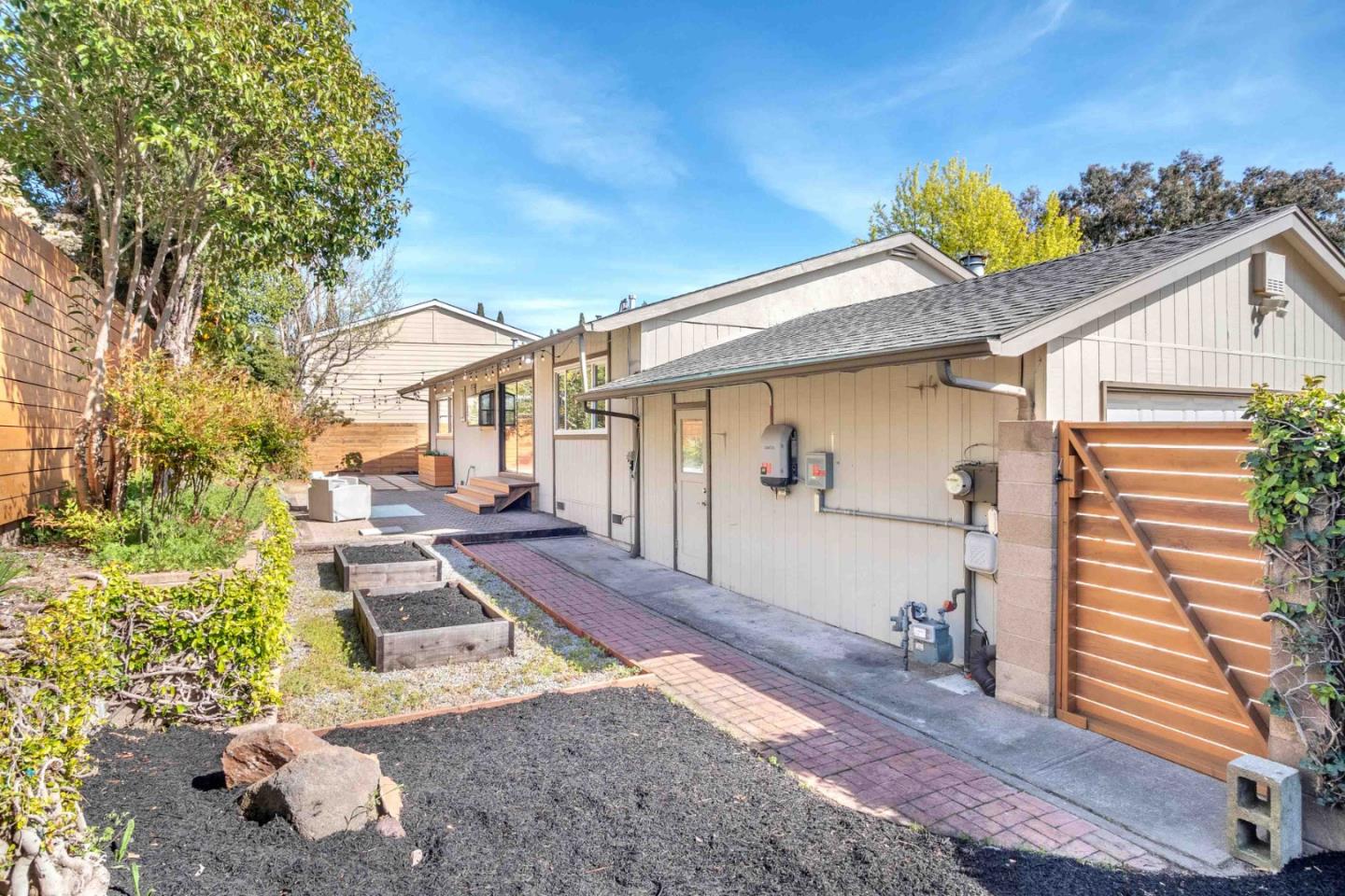 5519 Amend Road El Sobrante, CA 94803 - Photo 30 of 38 a front view of a house with garden