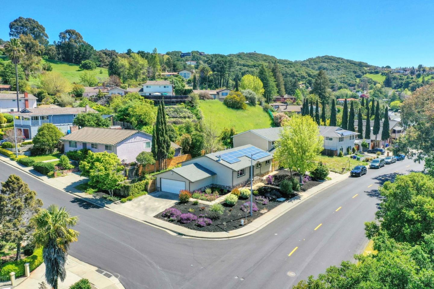 5519 Amend Road El Sobrante, CA 94803 - Photo 35 of 38 a view of a garden with a table and chairs