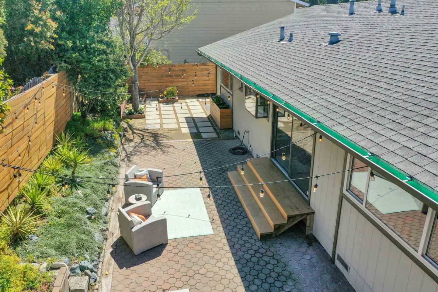 5519 Amend Road El Sobrante, CA 94803 - Photo 38 of 38 a balcony with wooden floor and outdoor seating