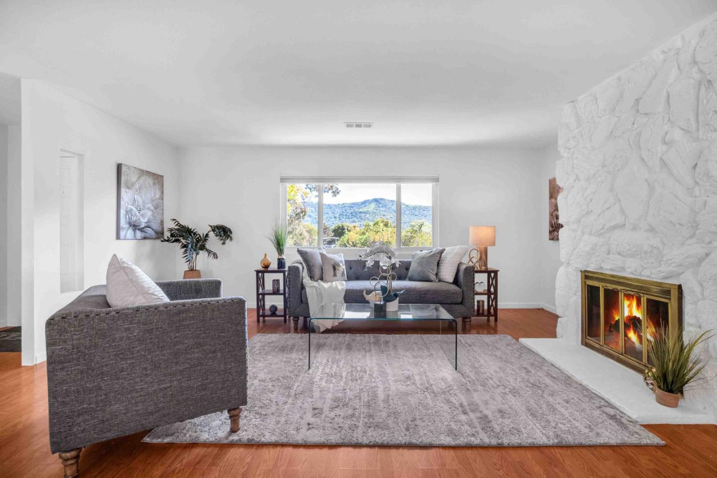 5519 Amend Road El Sobrante, CA 94803 - Photo 7 of 38 a living room with furniture and a fireplace