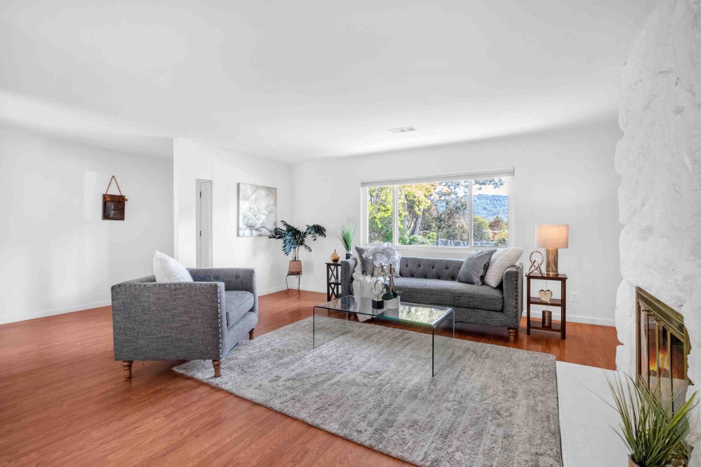 5519 Amend Road El Sobrante, CA 94803 - Photo 8 of 38 a living room with furniture and wooden floor