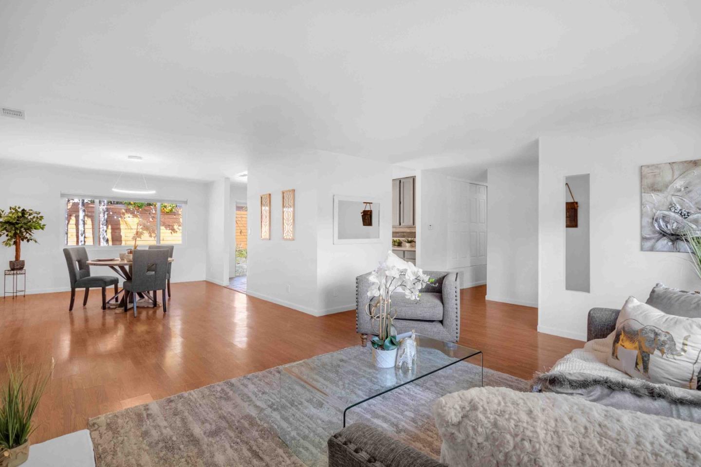 5519 Amend Road El Sobrante, CA 94803 - Photo 10 of 38 a living room with furniture and wooden floor