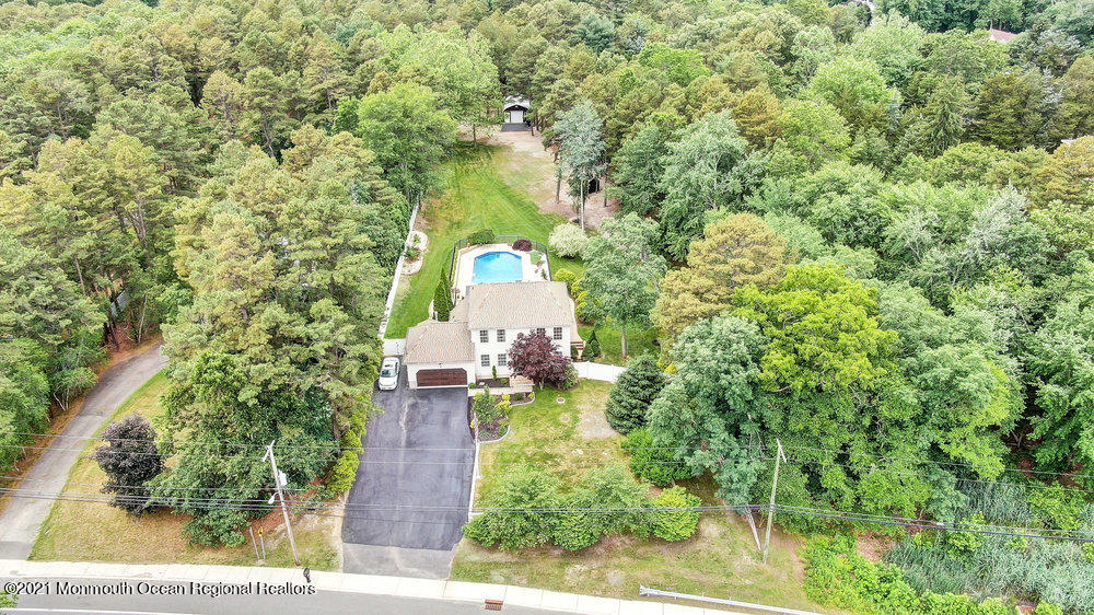 476 Cassville Road Jackson, NJ 08527 - Photo 3 of 40 an aerial view of residential house with outdoor space and trees all around