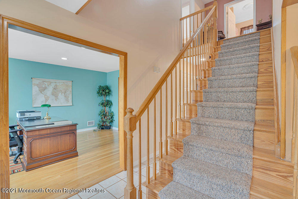 476 Cassville Road Jackson, NJ 08527 - Photo 22 of 40 a view of entryway and hall with wooden floor