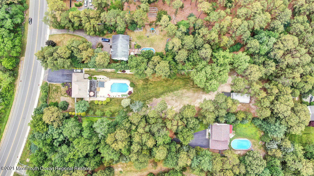 476 Cassville Road Jackson, NJ 08527 - Photo 40 of 40 an aerial view of a house with a yard and trees