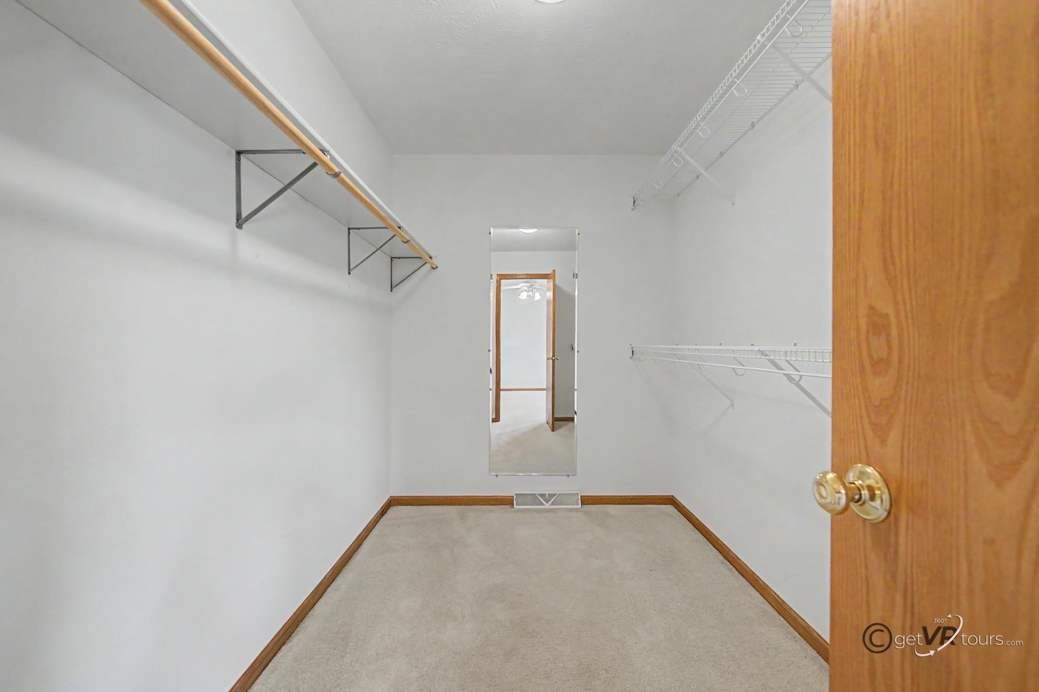 3127 Sandy Pointe Drive Freeport, IL 61032 - Photo 11 of 35 a view of a room with rack on the wall and a window