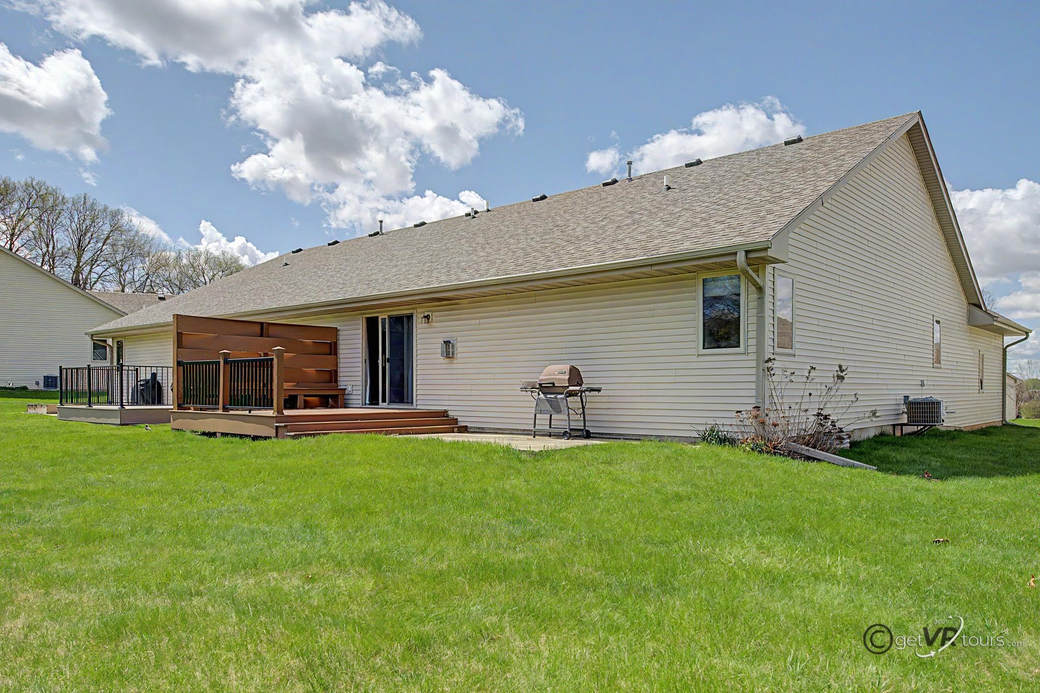 3127 Sandy Pointe Drive Freeport, IL 61032 - Photo 24 of 35 a view of a house with a backyard