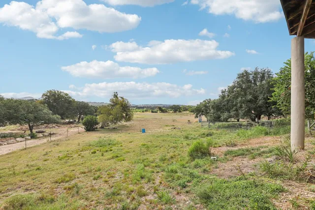 a view of a yard with an outdoor space