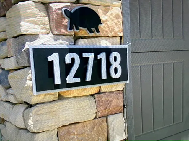 a kitchen with windows and sink