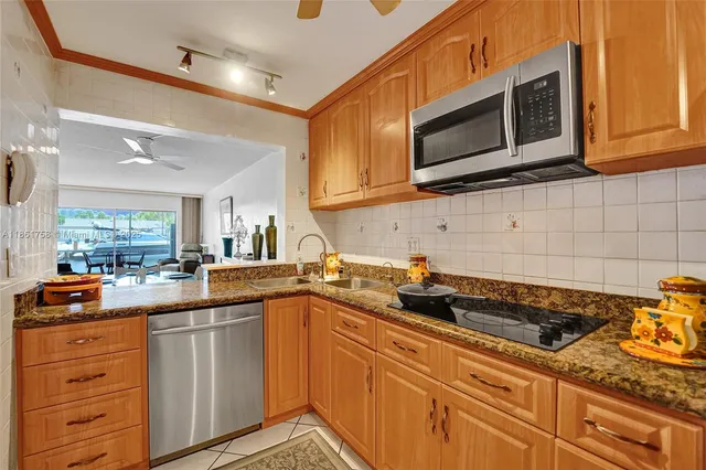 $249,900 | 455 Paradise Isle Boulevard, Unit 104, Hallandale Beach, FL 33009