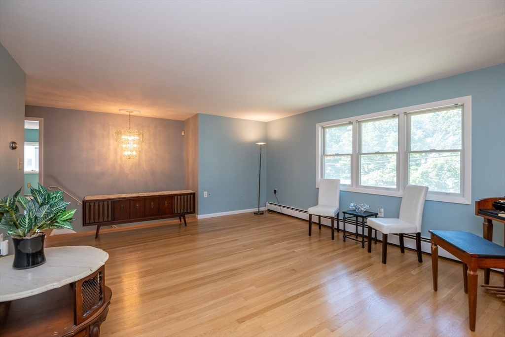 27 Station Road Salem, MA 01970 - Photo 4 of 31 a dining room with furniture and wooden floor