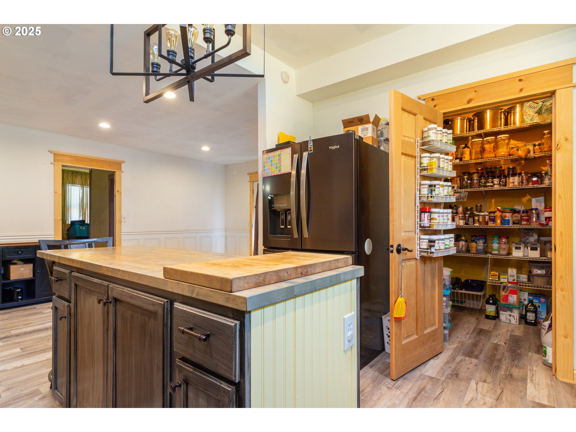 220 Cannon Street Heppner, OR 97836 - Photo 24 of 25 a kitchen with a refrigerator and a sink