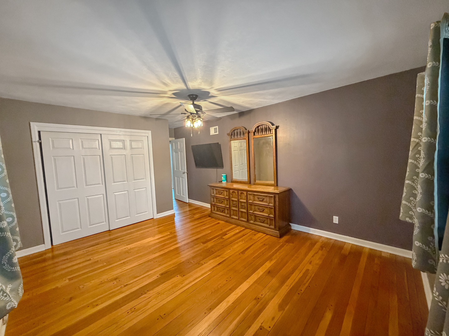 1126 West Stover Street Freeport, IL 61032 - Photo 16 of 35 a view of a livingroom with a furniture and chandelier fan