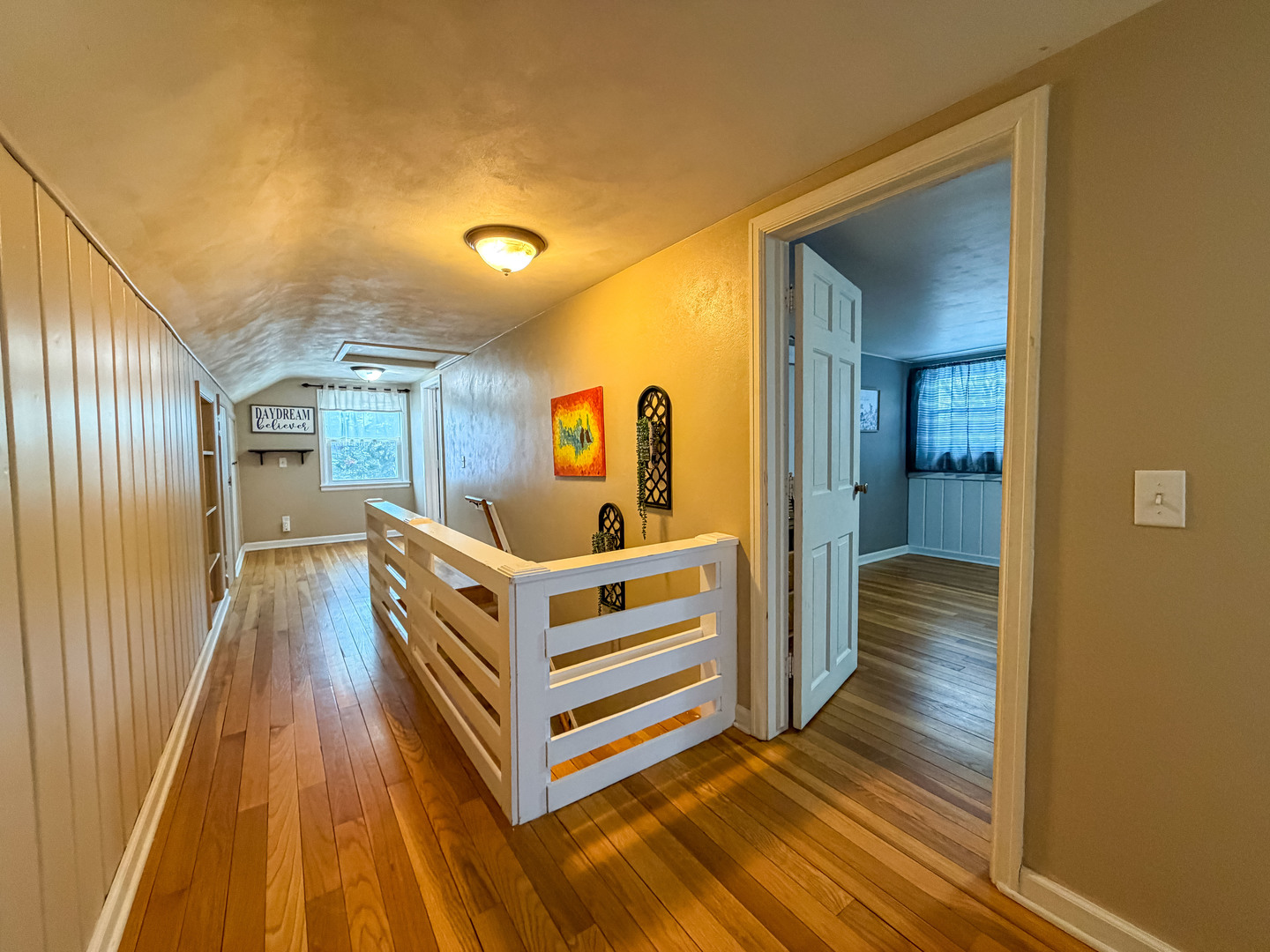 1126 West Stover Street Freeport, IL 61032 - Photo 21 of 35 a view of a hallway with wooden floor and staircase