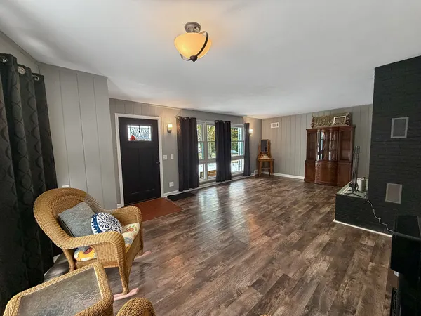 a kitchen with stainless steel appliances a stove a sink and a refrigerator