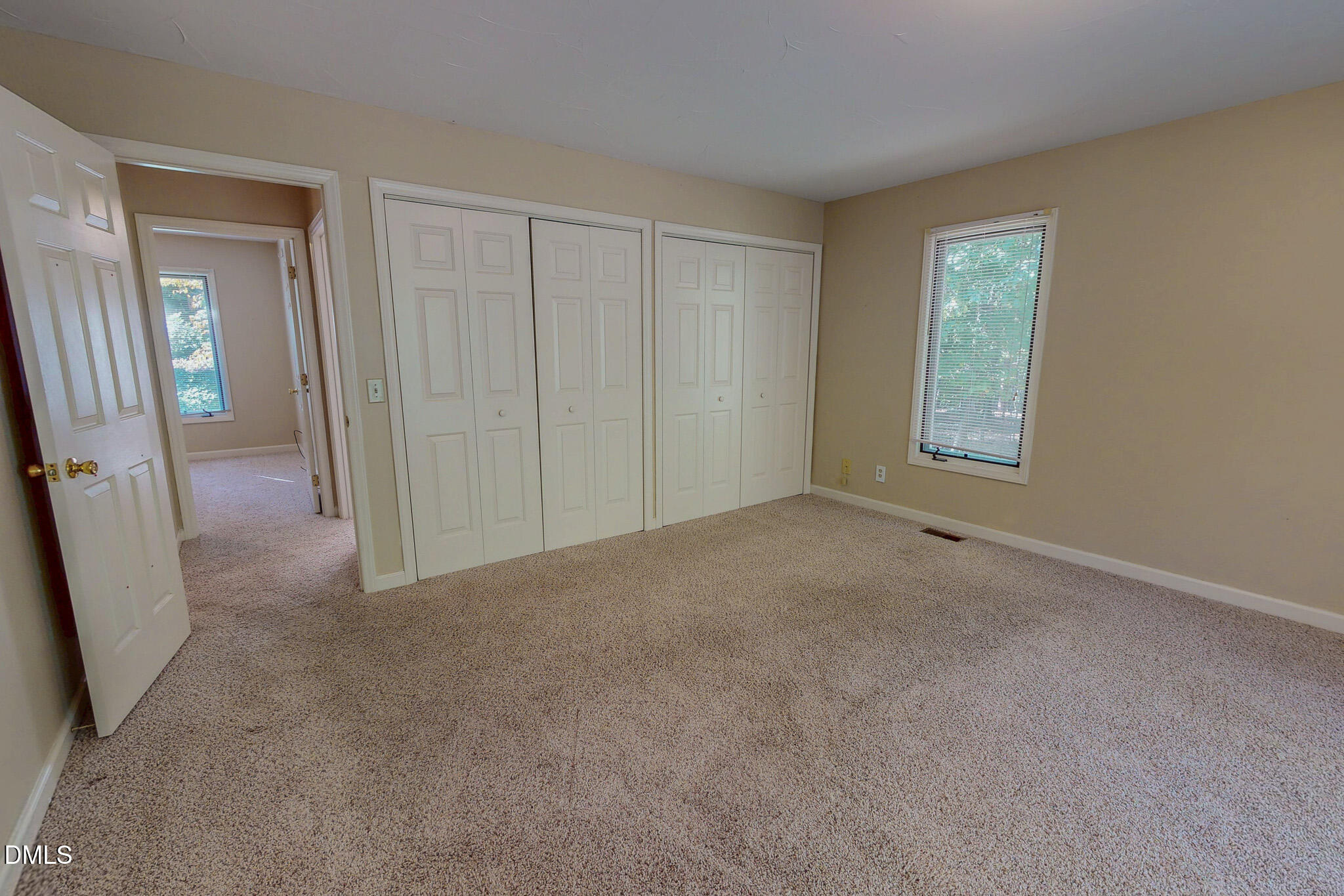 11 Denada Path Roxboro, NC 27574 - Photo 29 of 62 a view of an empty room with glass door and a window