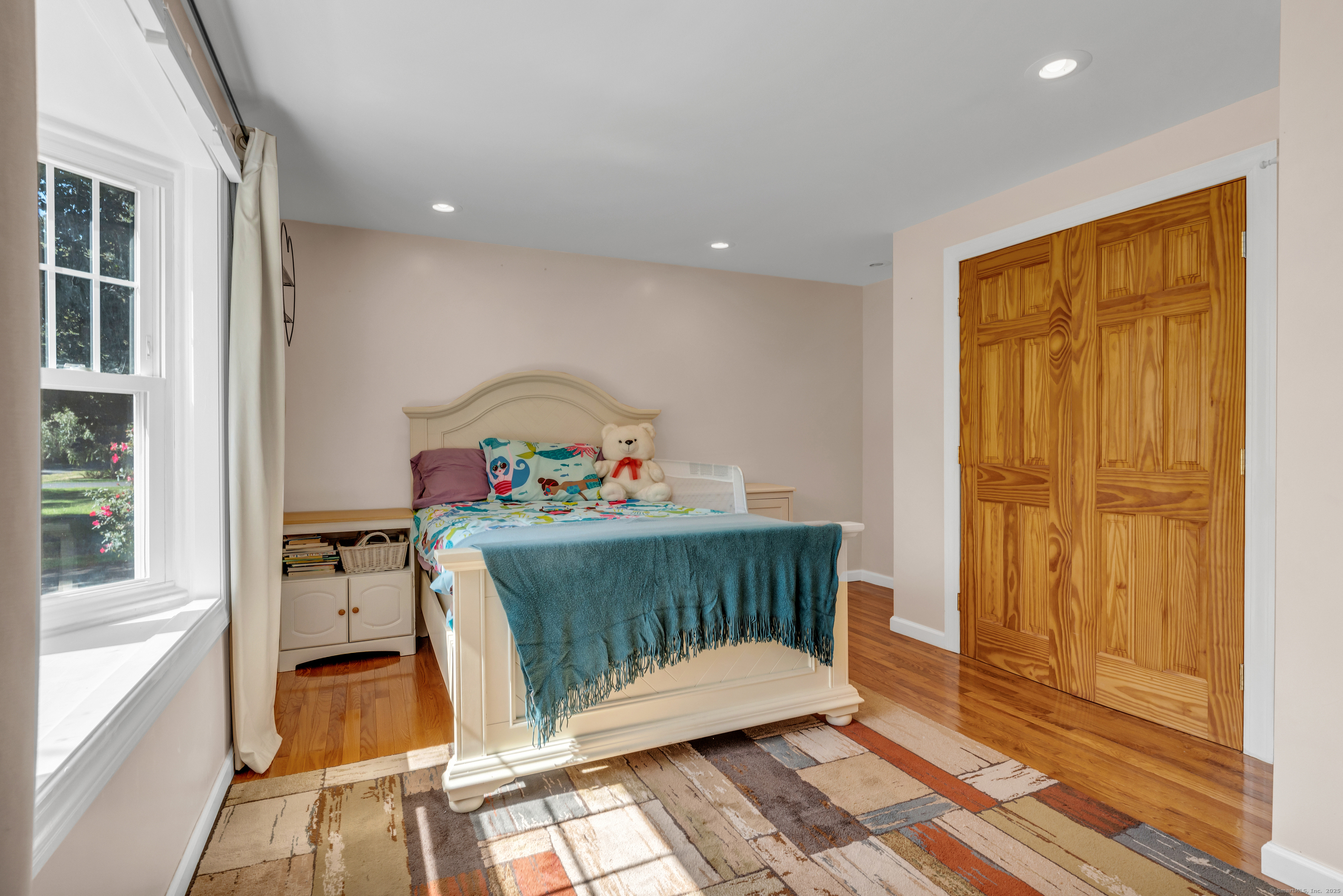 64 Dohm Avenue Guilford, CT 06437 - Photo 19 of 38 a bedroom with furniture and a window