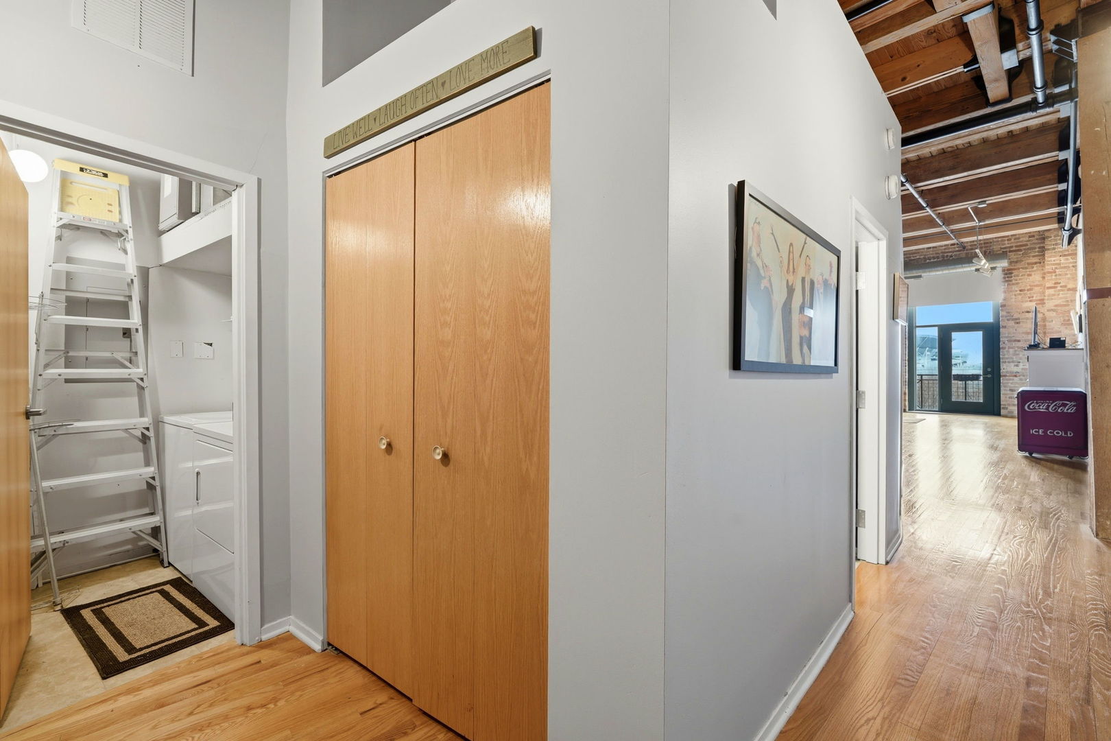 1550 South Indiana Avenue, Unit 401 Chicago, IL 60605 - Photo 15 of 20 a view of a bedroom with wooden floor and windows