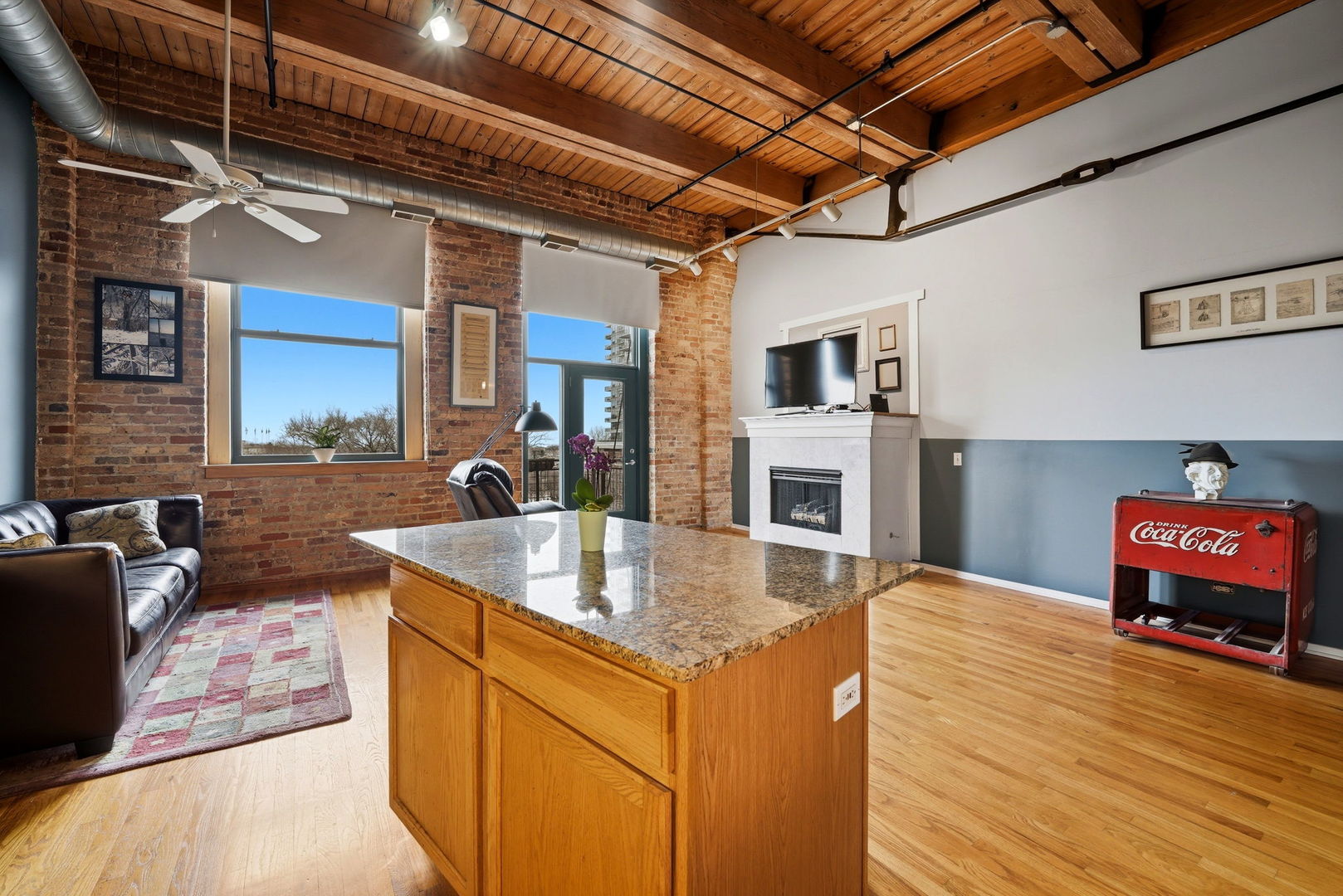 1550 South Indiana Avenue, Unit 401 Chicago, IL 60605 - Photo 2 of 20 a kitchen with sink refrigerator and stove
