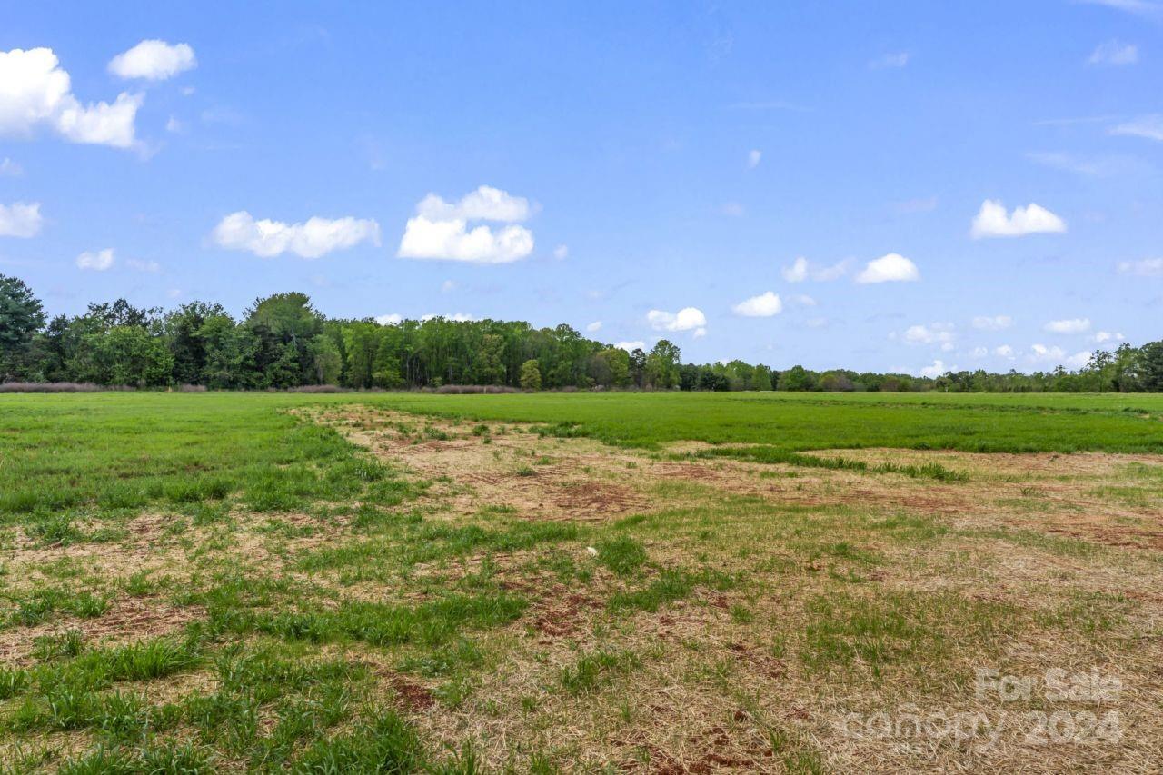 234 Briggs Road Salisbury, NC 28147 - Photo 35 of 35 a view of a lake with a big yard