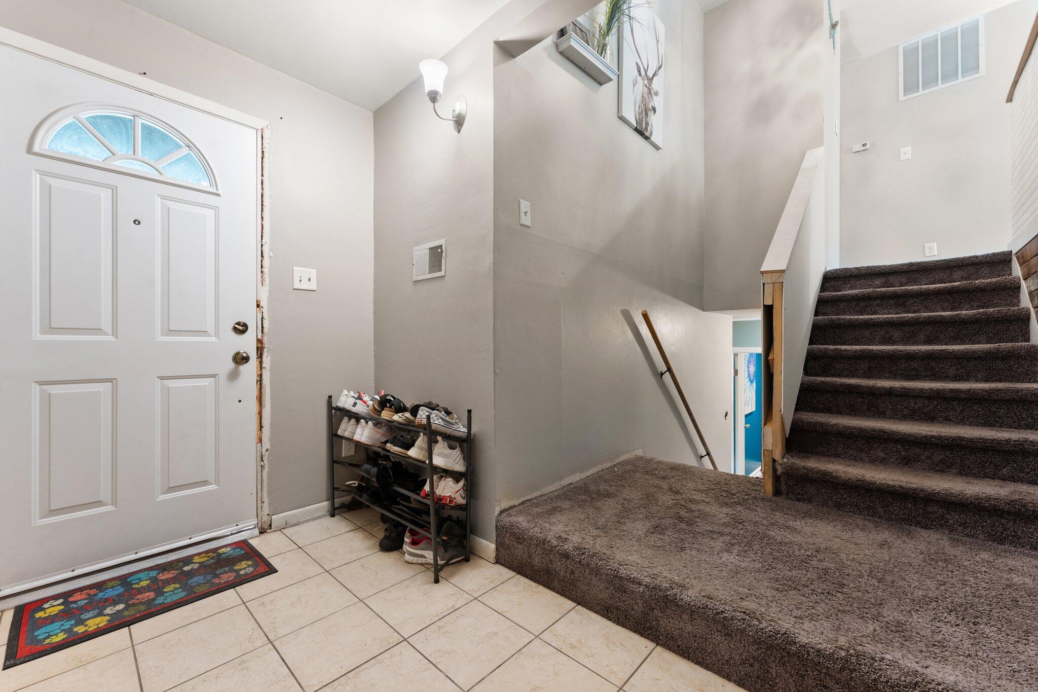714-1 Governor Road Valparaiso, IN 46385 - Photo 4 of 22 a view of an entryway with staircase