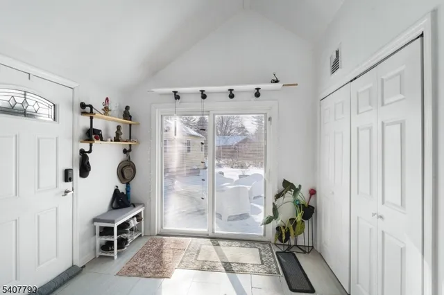 a view of entryway with livingroom and furniture