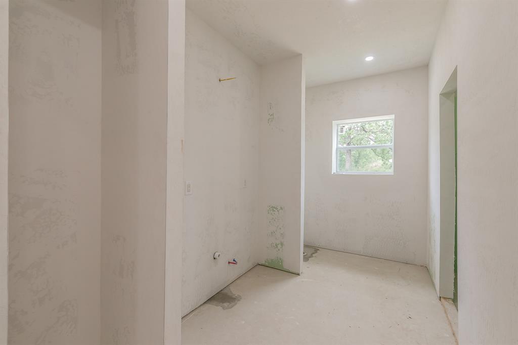 155 Corado Road Montague, TX 76251 - Photo 13 of 36 an empty room with windows