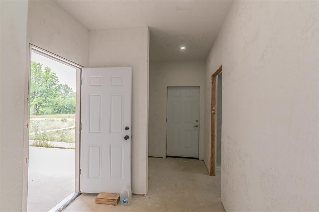 155 Corado Road Montague, TX 76251 - Photo 15 of 36 a view of an empty room with a window