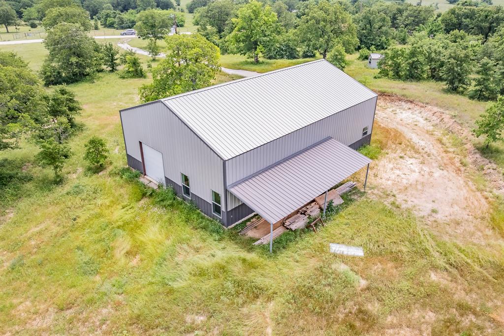 155 Corado Road Montague, TX 76251 - Photo 33 of 36 a view of a big yard with large trees