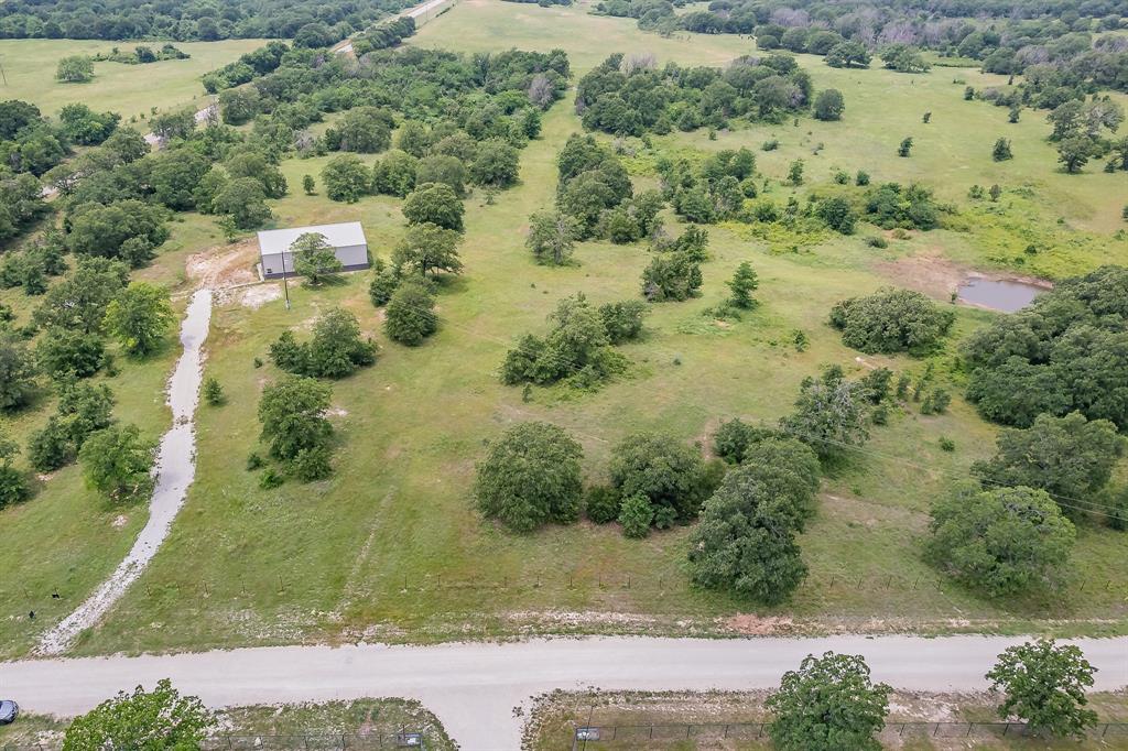 155 Corado Road Montague, TX 76251 - Photo 36 of 36 an aerial view of residential houses with outdoor space