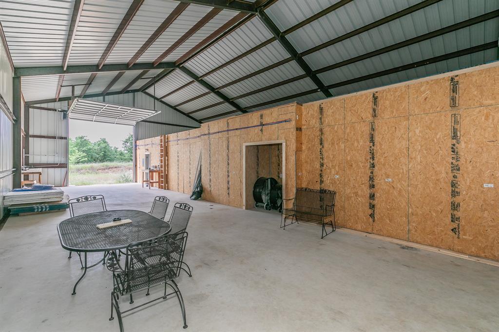 155 Corado Road Montague, TX 76251 - Photo 7 of 36 a view of an outdoor space with a table and chair