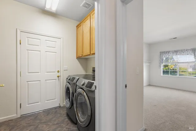 a bathroom with a shower and a mirror