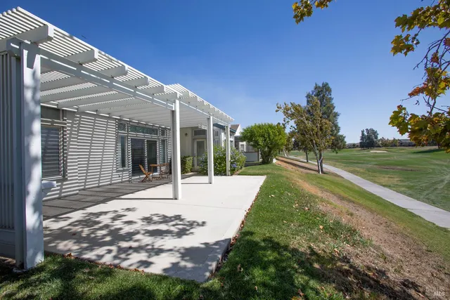 front view of a house with a garden