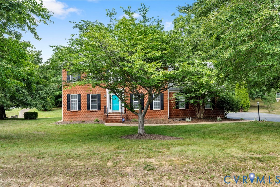 13524 Mountcastle Road Chesterfield, VA 23832 - Photo 2 of 44 Brick-front residence featuring a turquoise entry