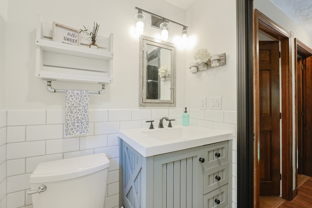 77 Dodge Road Sutton, MA 01590 - Photo 17 of 41 a bathroom with a sink a toilet and shower