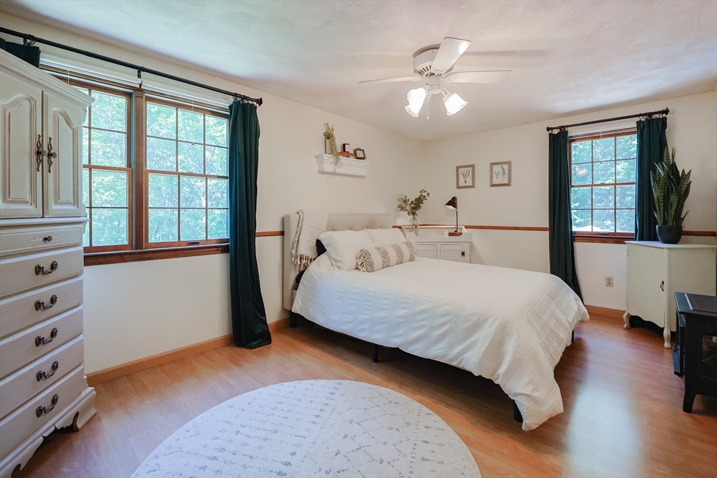 77 Dodge Road Sutton, MA 01590 - Photo 20 of 41 a bedroom with a large bed and a window