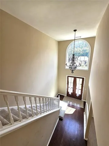 a view of entryway with wooden floor