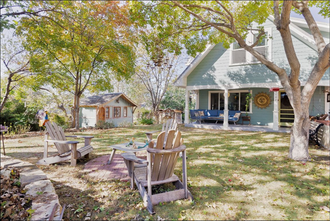 2102 Travis Heights Boulevard Austin, TX 78704 - Photo 2 of 28 a view of a house with a yard patio and fire pit