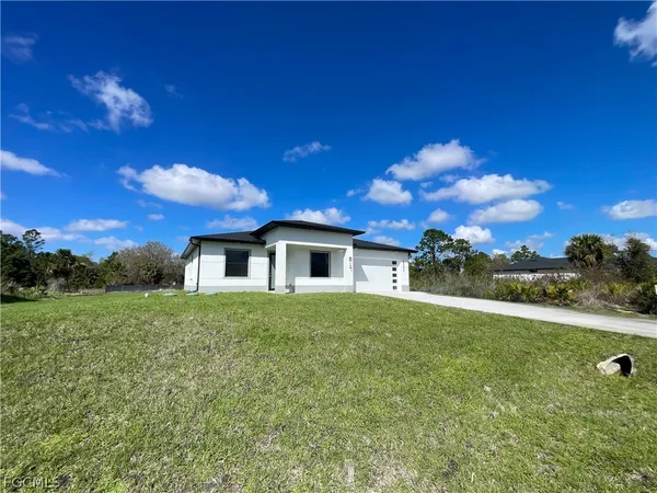 an aerial view of residential house with parking space