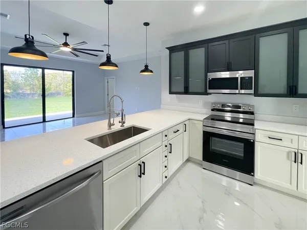 an aerial view of residential house with parking space