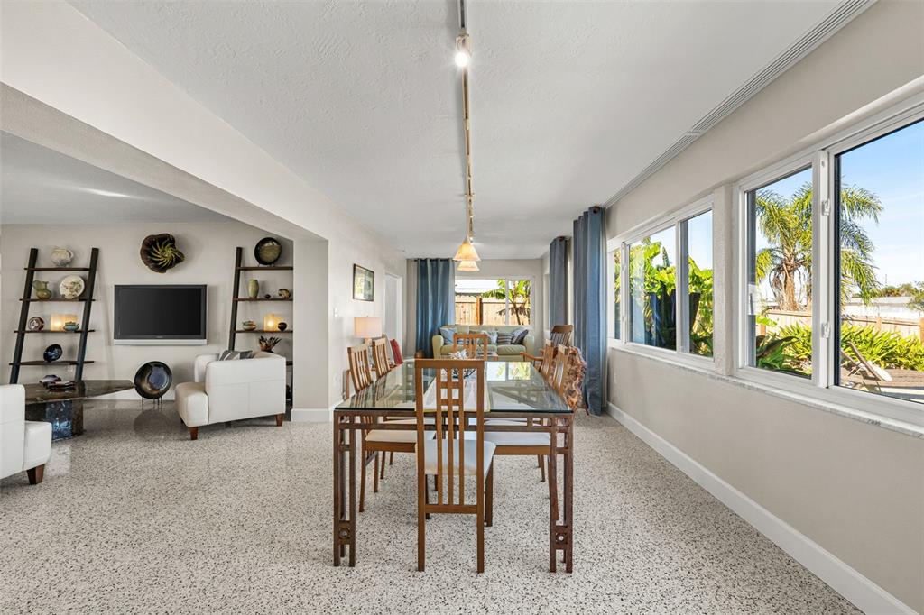 4908 Arlington Road Palmetto, FL 34221 - Photo 15 of 36 a living room with furniture and a large window