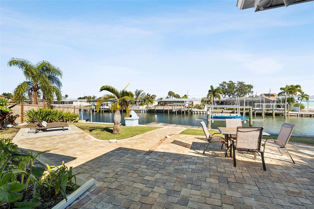 4908 Arlington Road Palmetto, FL 34221 - Photo 2 of 36 a view of a lake with chairs