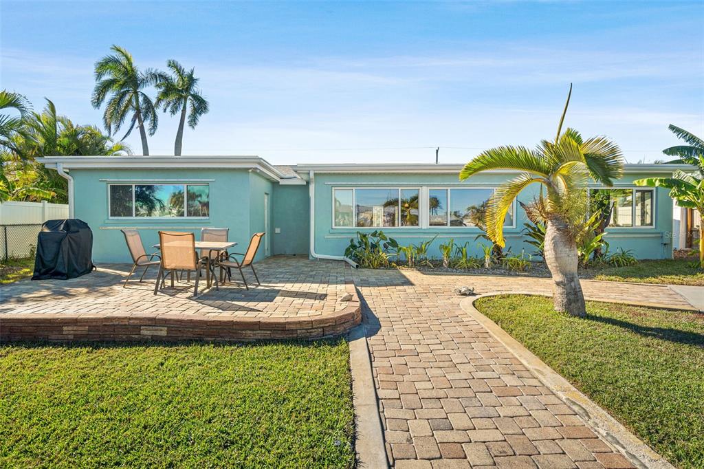 4908 Arlington Road Palmetto, FL 34221 - Photo 27 of 36 a house view with a garden space