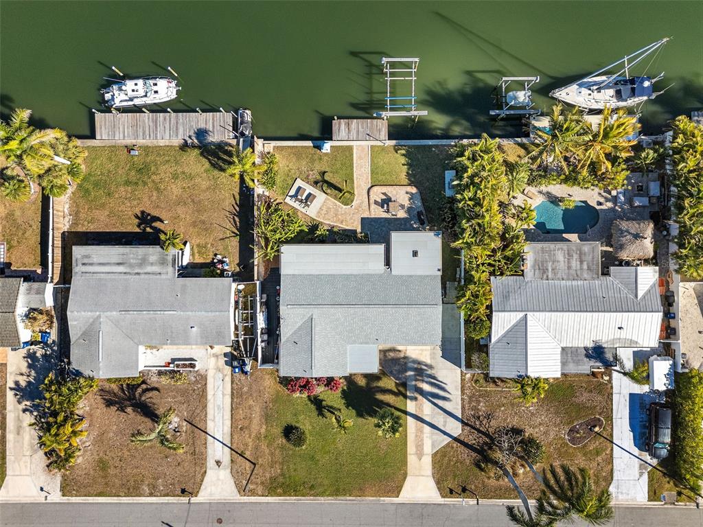 4908 Arlington Road Palmetto, FL 34221 - Photo 36 of 36 an aerial view of a house with a swimming pool