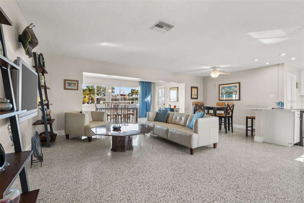 4908 Arlington Road Palmetto, FL 34221 - Photo 8 of 36 a living room with furniture and a flat screen tv