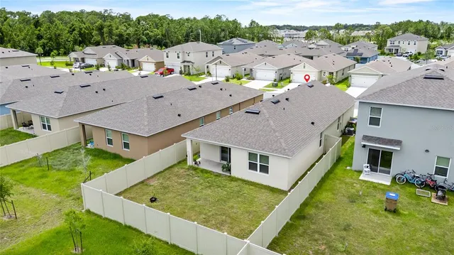 a view of a house with a big yard